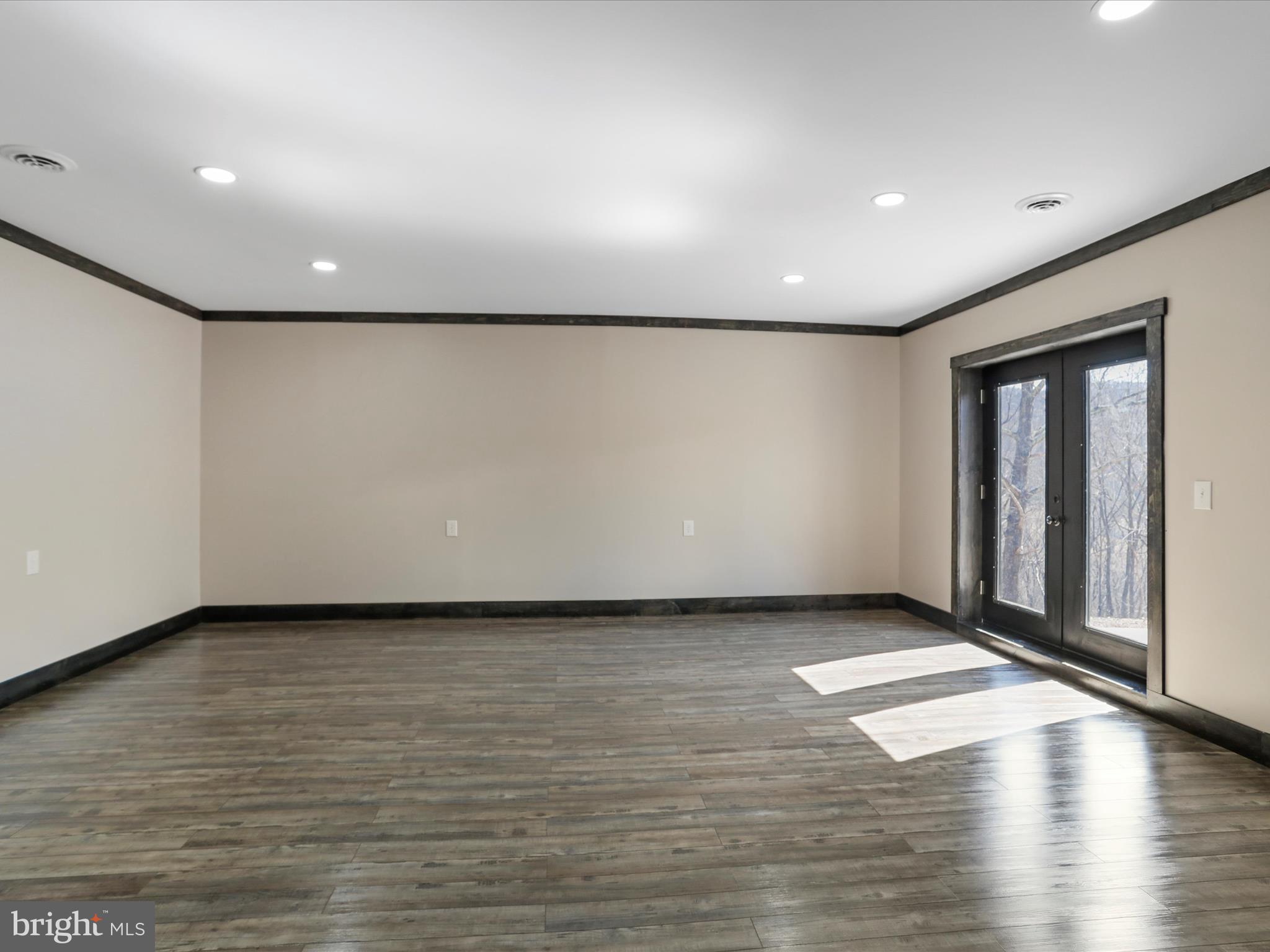783 Community Way Road Romney, WV 26757 - Photo 46 of 83 a view of a livingroom with wooden floor