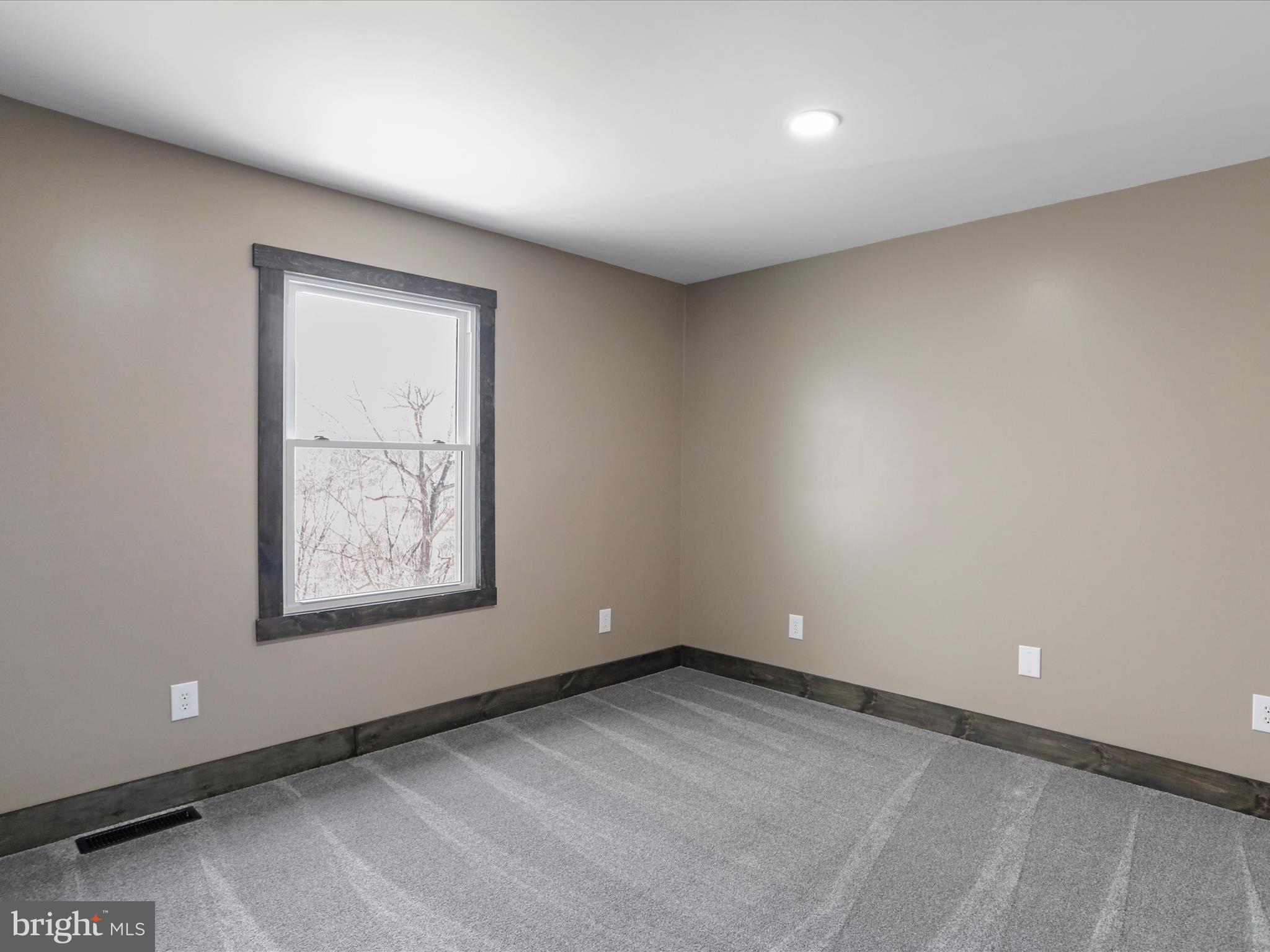 783 Community Way Road Romney, WV 26757 - Photo 50 of 83 an empty room with a window
