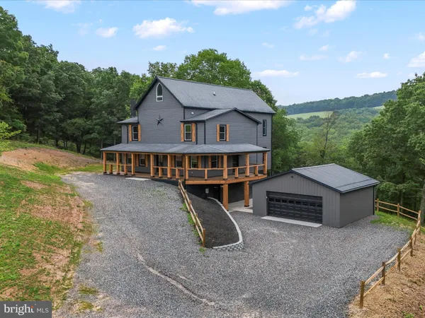 a front view of a house with glass windows