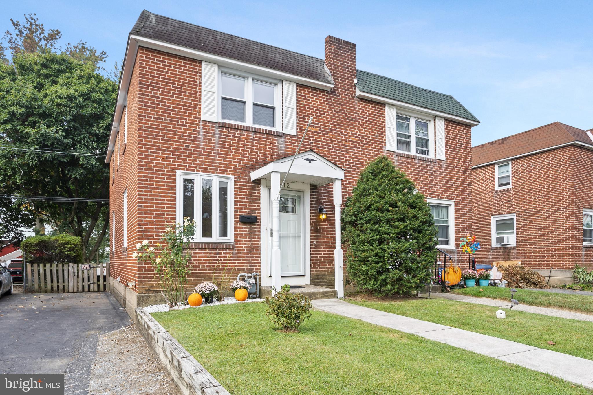 512 W Road Ridley Park, PA 19078 - Photo 1 of 25 a front view of a house with a yard