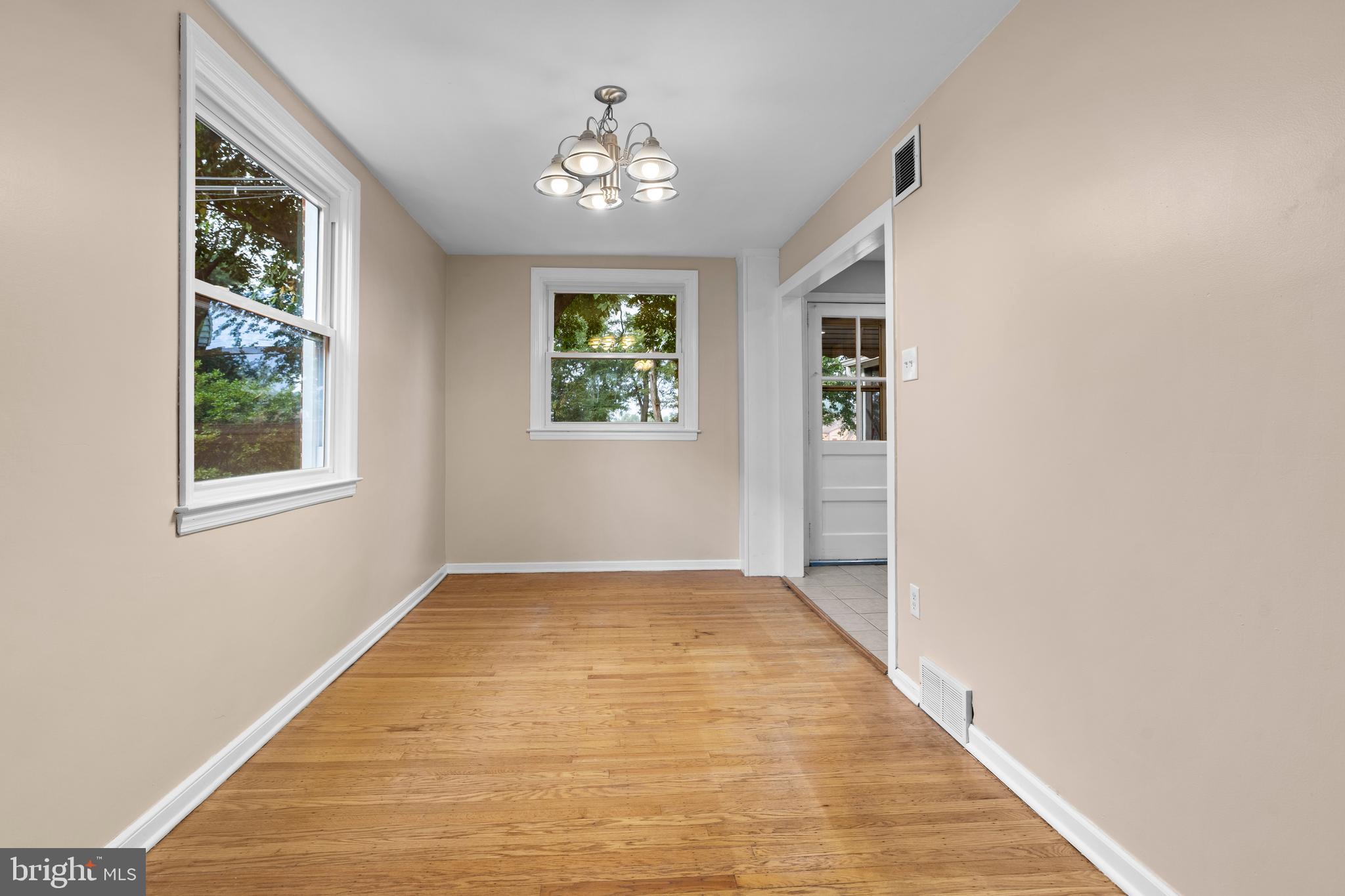 512 W Road Ridley Park, PA 19078 - Photo 6 of 25 an empty room with windows