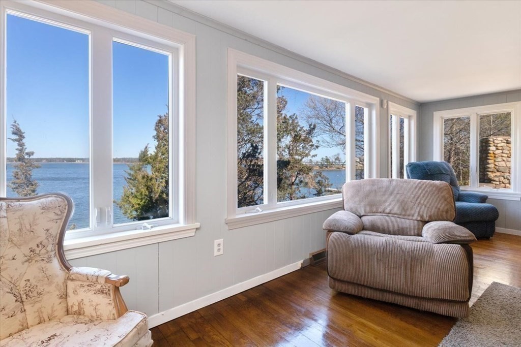 157 Daniels Island Road Mashpee, MA 02649 - Photo 17 of 41 a living room with furniture and a large window