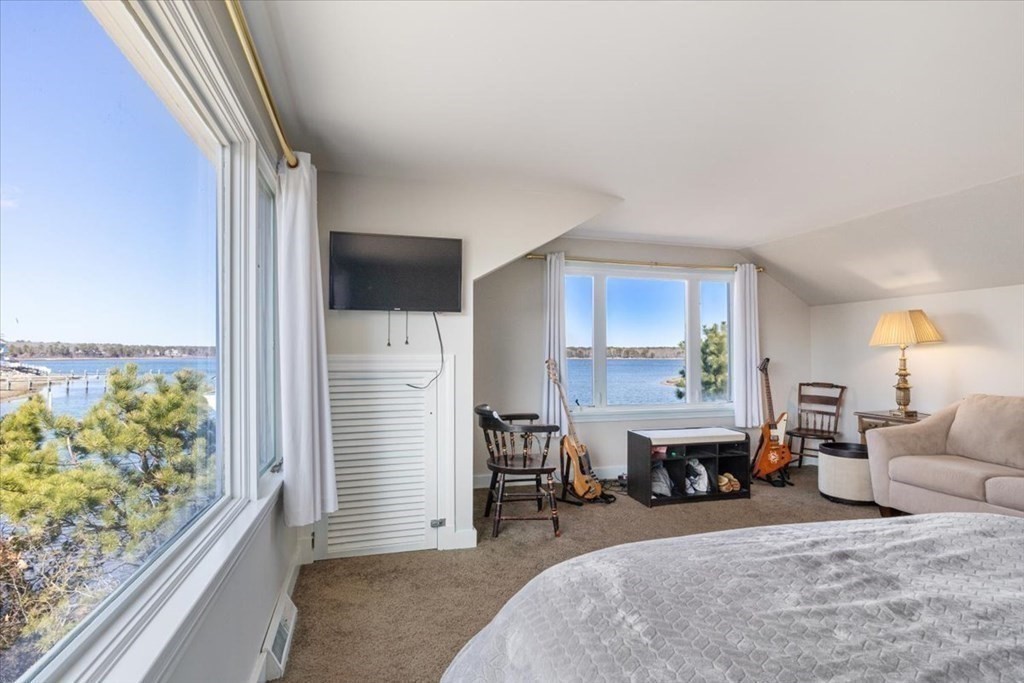 157 Daniels Island Road Mashpee, MA 02649 - Photo 21 of 41 a bedroom with furniture and a window