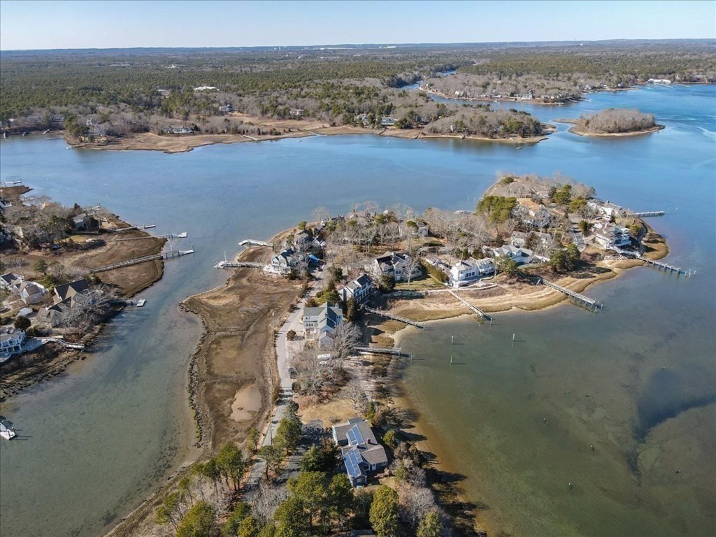 157 Daniels Island Road Mashpee, MA 02649 - Photo 27 of 41 an aerial view of a houses with ocean view