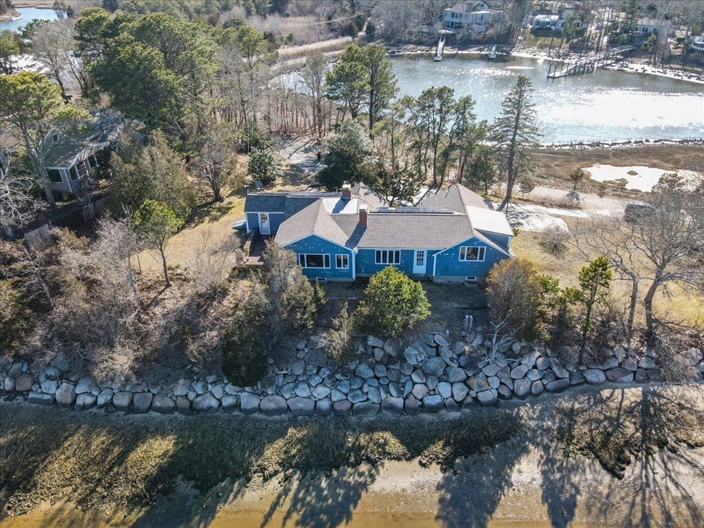 157 Daniels Island Road Mashpee, MA 02649 - Photo 3 of 41 a aerial view of a house with a lake view