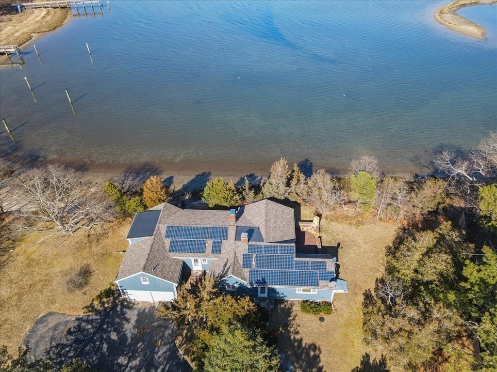 157 Daniels Island Road Mashpee, MA 02649 - Photo 7 of 41 an aerial view of a house with a yard