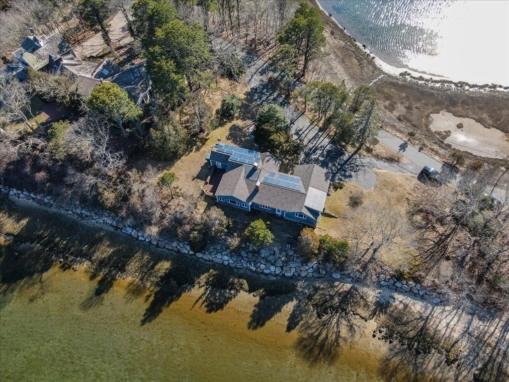 157 Daniels Island Road Mashpee, MA 02649 - Photo 8 of 41 an aerial view of a house with a yard