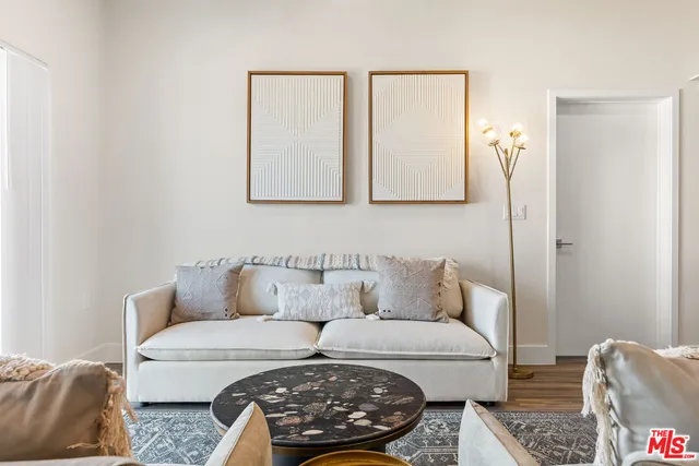 a living room with furniture and a couch