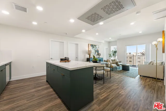 a room with a sink and a mirror