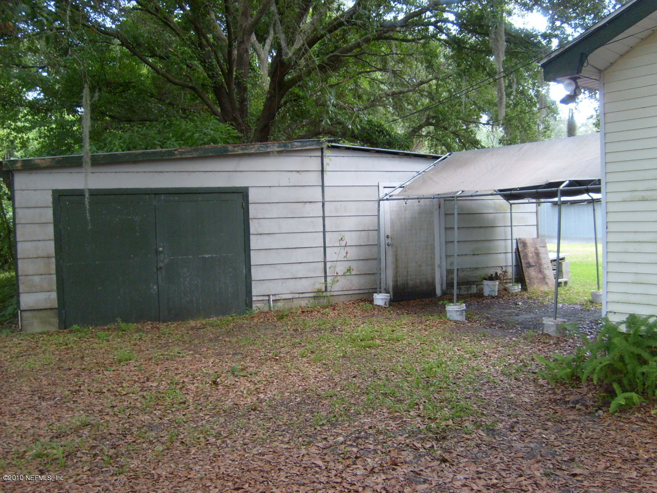 12975 Yellow Bluff Road Jacksonville, FL 32226 - Photo 2 of 5 a view of a house with a garage