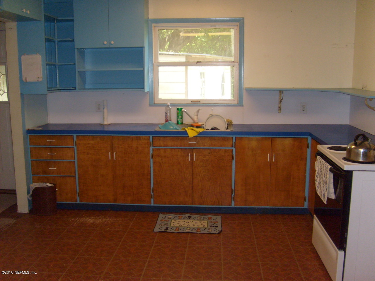 12975 Yellow Bluff Road Jacksonville, FL 32226 - Photo 5 of 5 a kitchen with a sink and cabinets