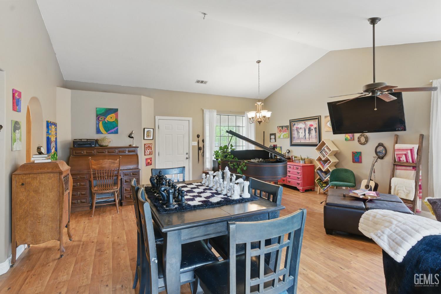 Undisclosed Address Tehachapi, CA 93561 - Photo 13 of 40 a living room with furniture and a flat screen tv