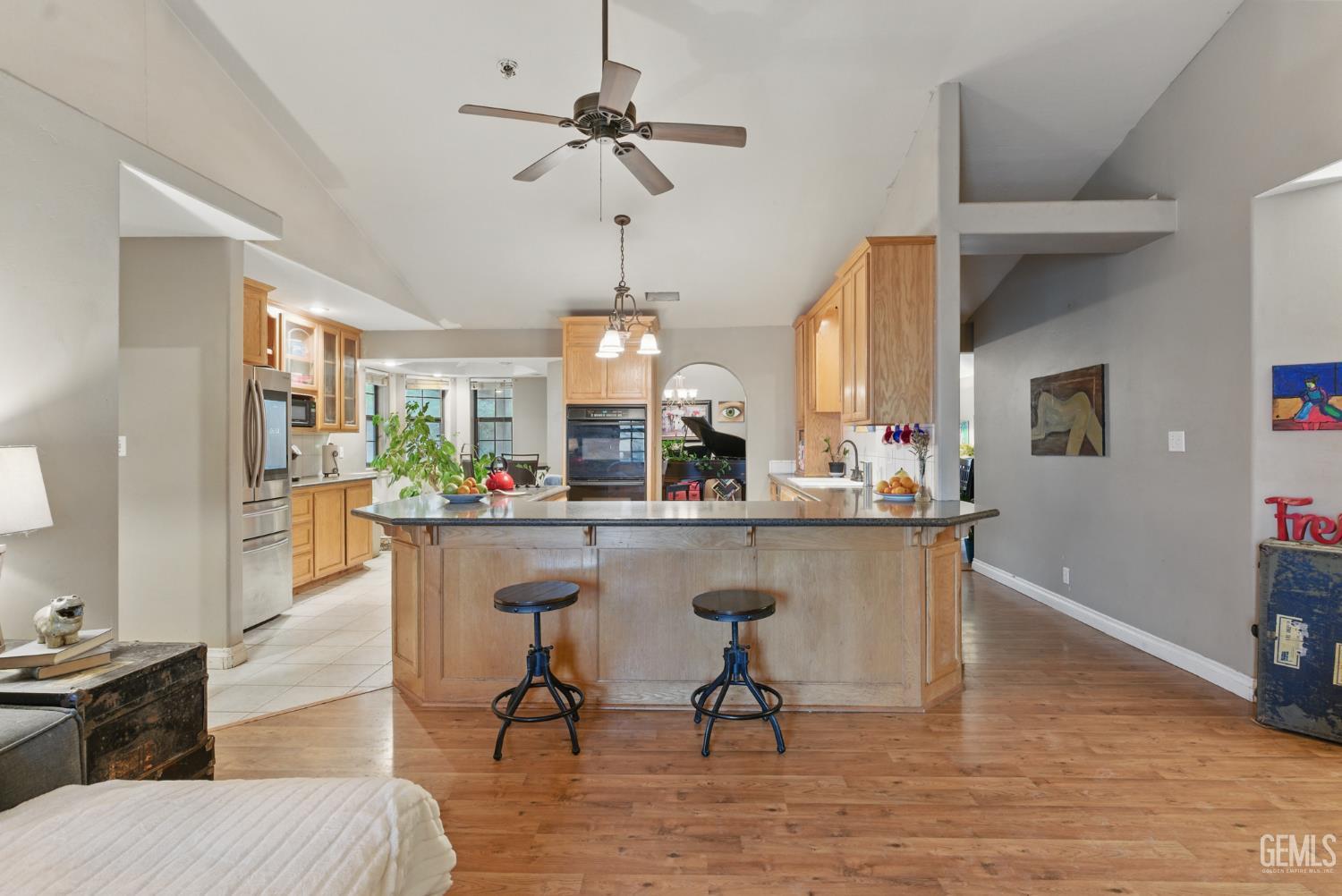 Undisclosed Address Tehachapi, CA 93561 - Photo 14 of 40 a view of a dining room with furniture window and wooden floor