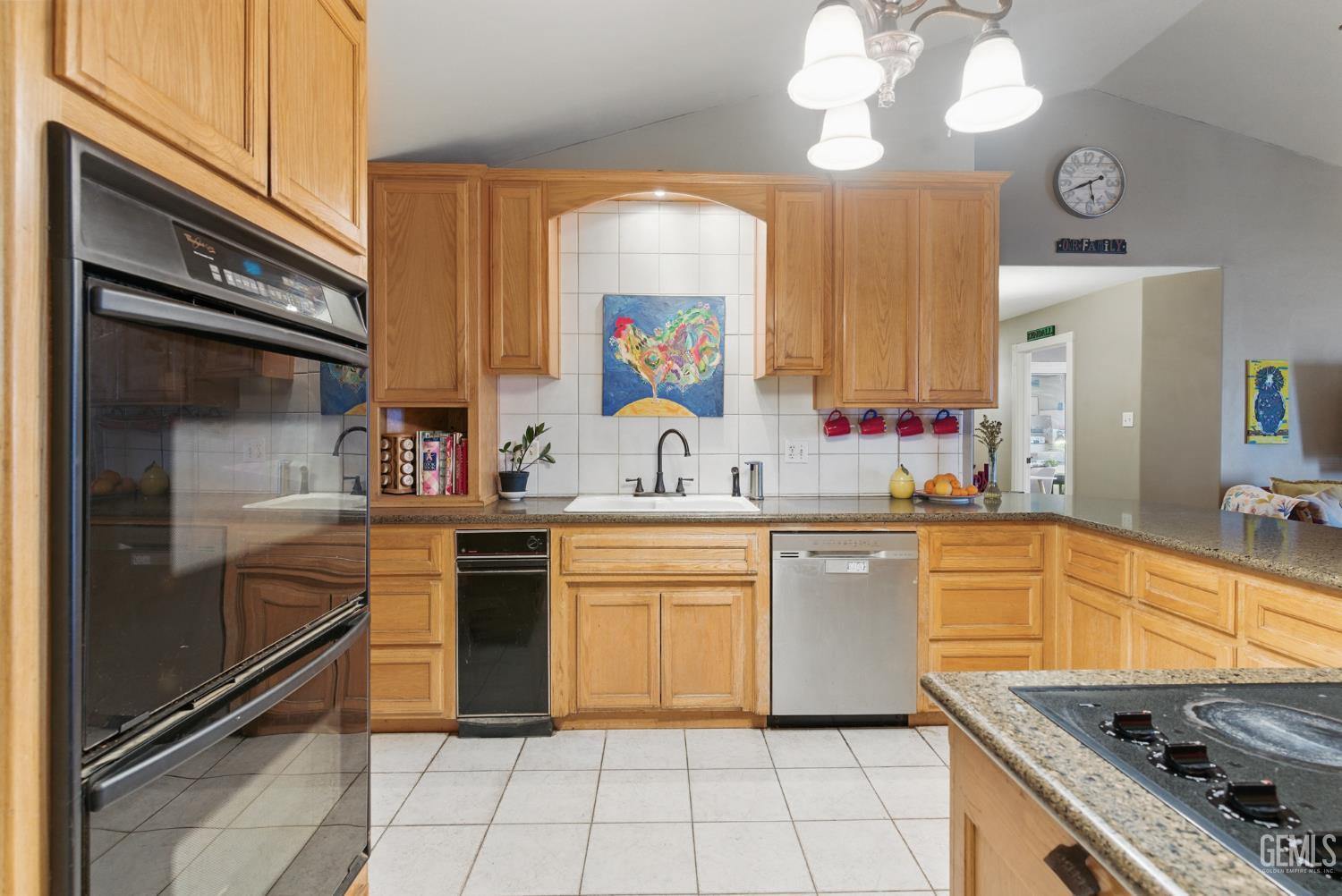 Undisclosed Address Tehachapi, CA 93561 - Photo 18 of 40 a large kitchen with cabinets and stainless steel appliances