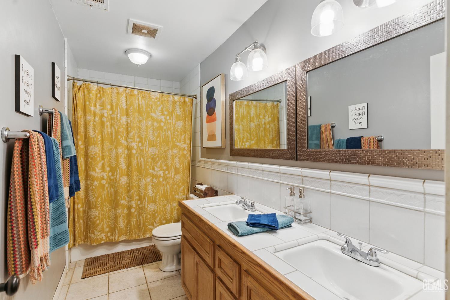 Undisclosed Address Tehachapi, CA 93561 - Photo 26 of 40 a bathroom with a sink toilet double vanity and shower