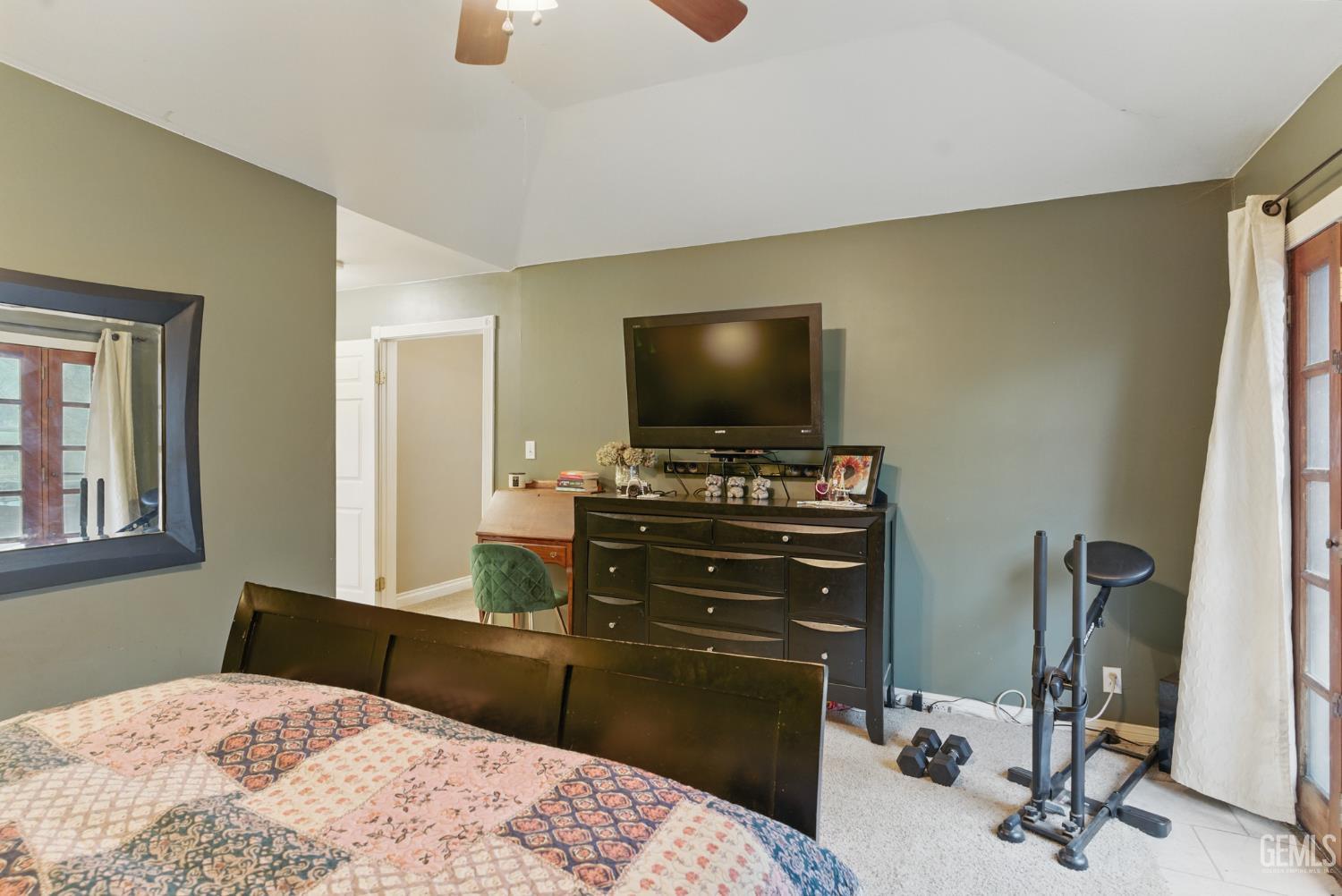 Undisclosed Address Tehachapi, CA 93561 - Photo 29 of 40 a bedroom with a bed and a flat screen tv