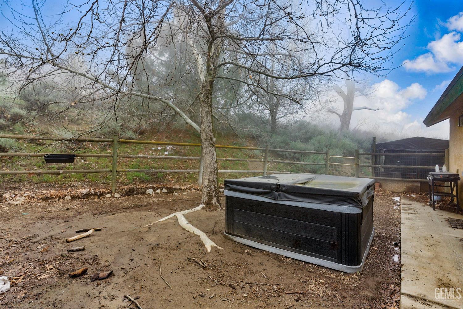 Undisclosed Address Tehachapi, CA 93561 - Photo 35 of 40 a view of a wooden deck and a yard