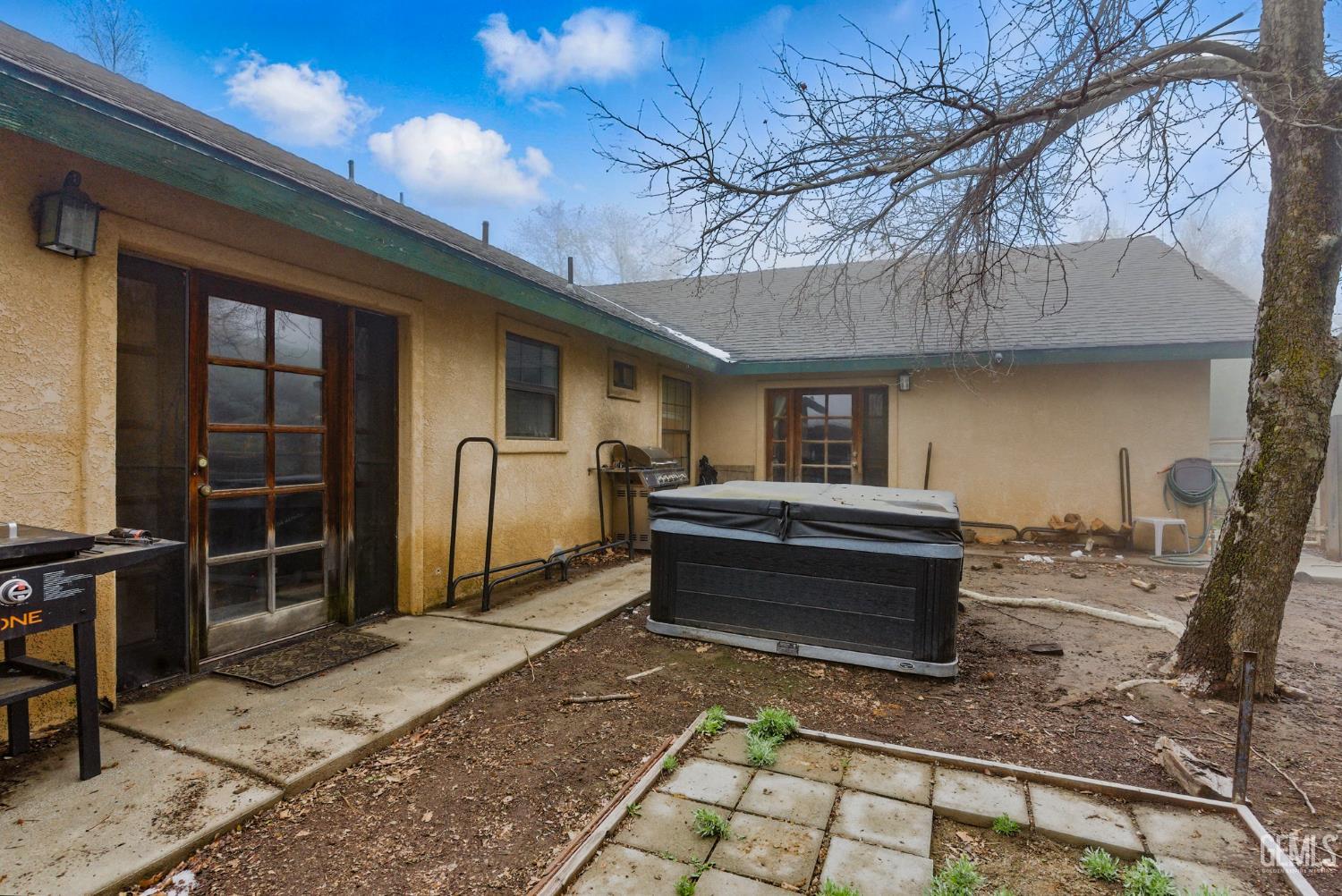 Undisclosed Address Tehachapi, CA 93561 - Photo 36 of 40 a backyard of a house with barbeque oven and outdoor seating