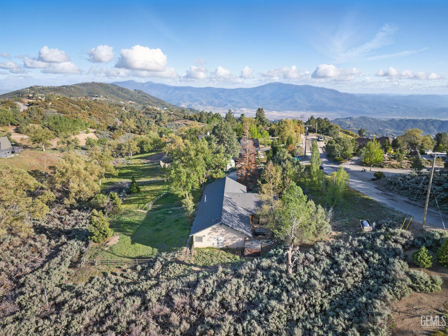 Undisclosed Address Tehachapi, CA 93561 - Photo 7 of 40 a view of a lake with lots of trees