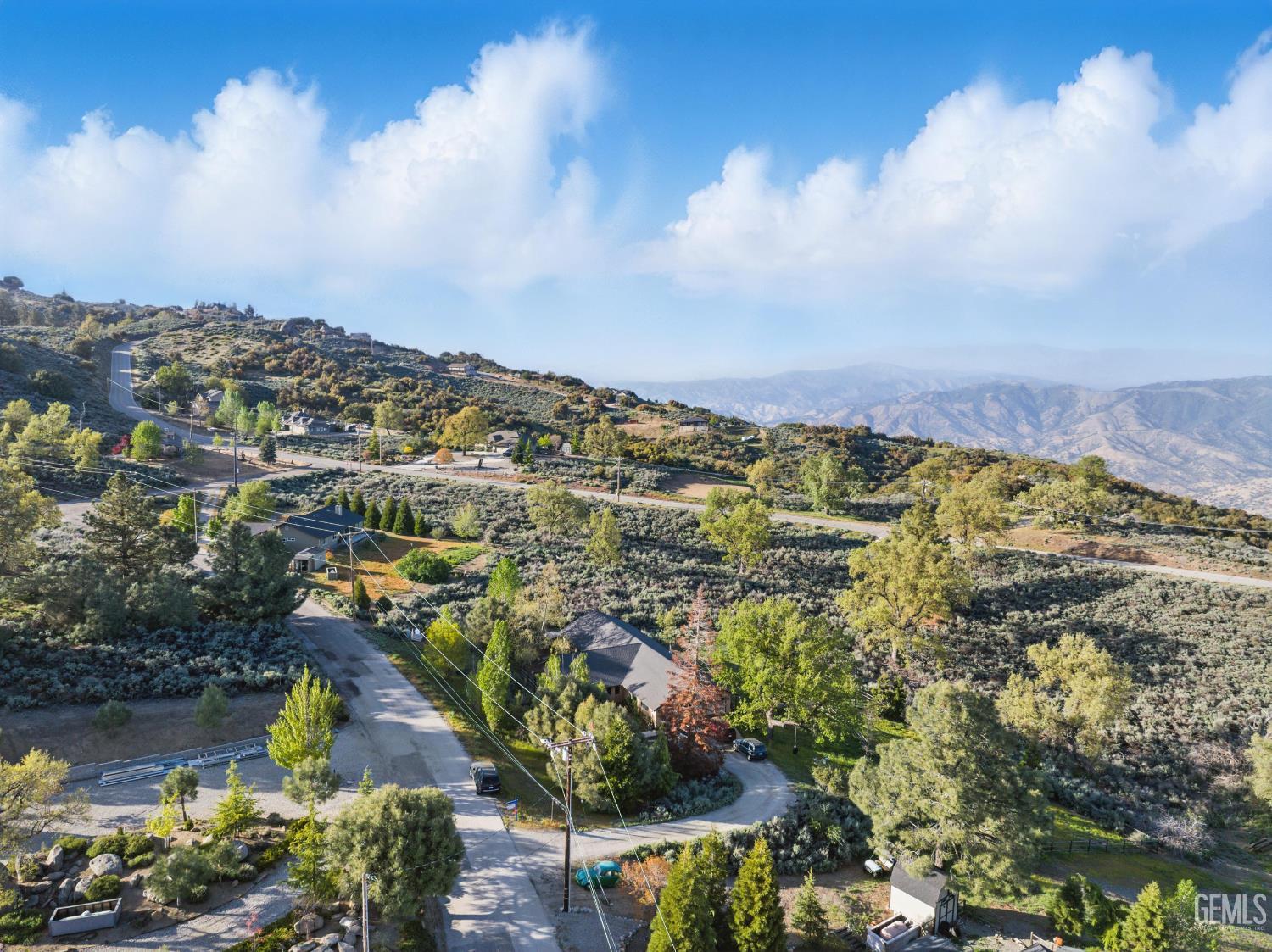 Undisclosed Address Tehachapi, CA 93561 - Photo 8 of 40 an aerial view of residential houses with outdoor space