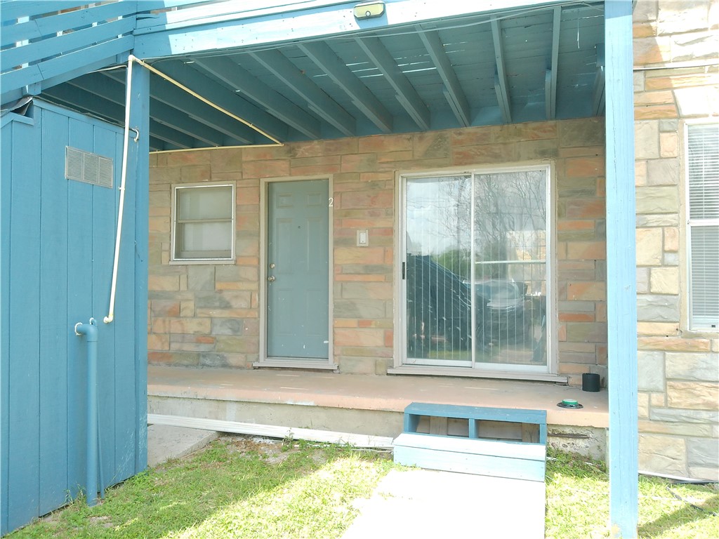 829 Indiana Avenue, Unit 2 Corpus Christi, TX 78404 - Photo 2 of 12 a view of a wooden door