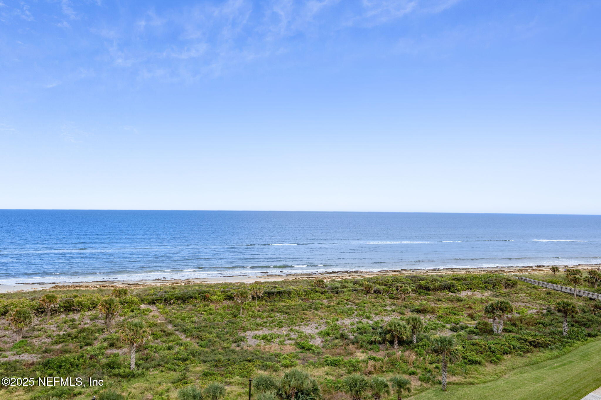 60 Surfview Drive, Unit 801 Palm Coast, FL 32137 - Photo 22 of 64 a view of an ocean and a yard