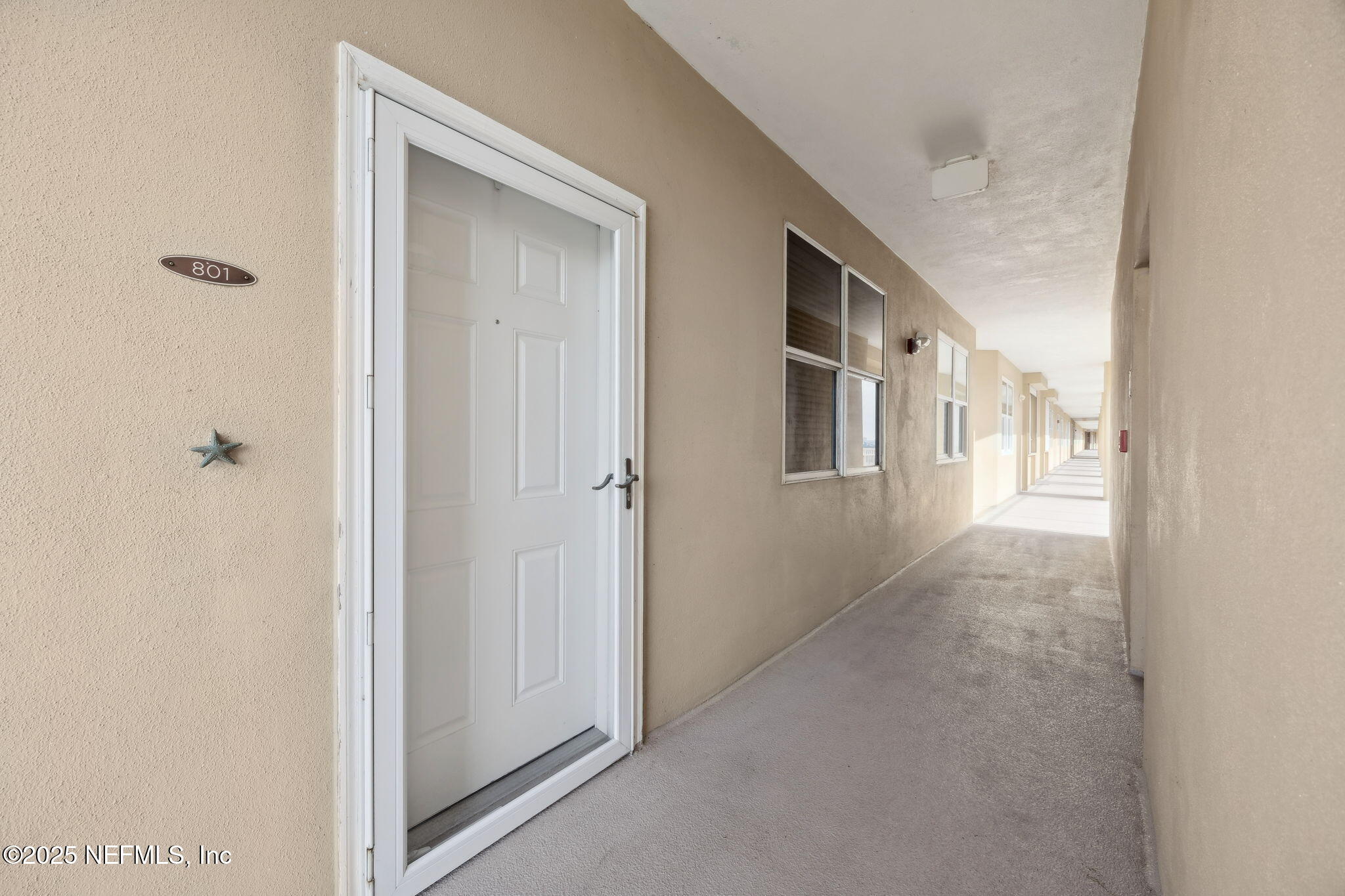 60 Surfview Drive, Unit 801 Palm Coast, FL 32137 - Photo 3 of 64 a view of a hallway