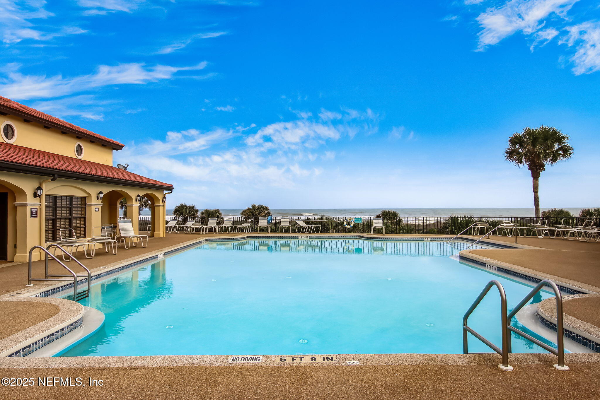 60 Surfview Drive, Unit 801 Palm Coast, FL 32137 - Photo 36 of 64 a view of a lake with couches chairs