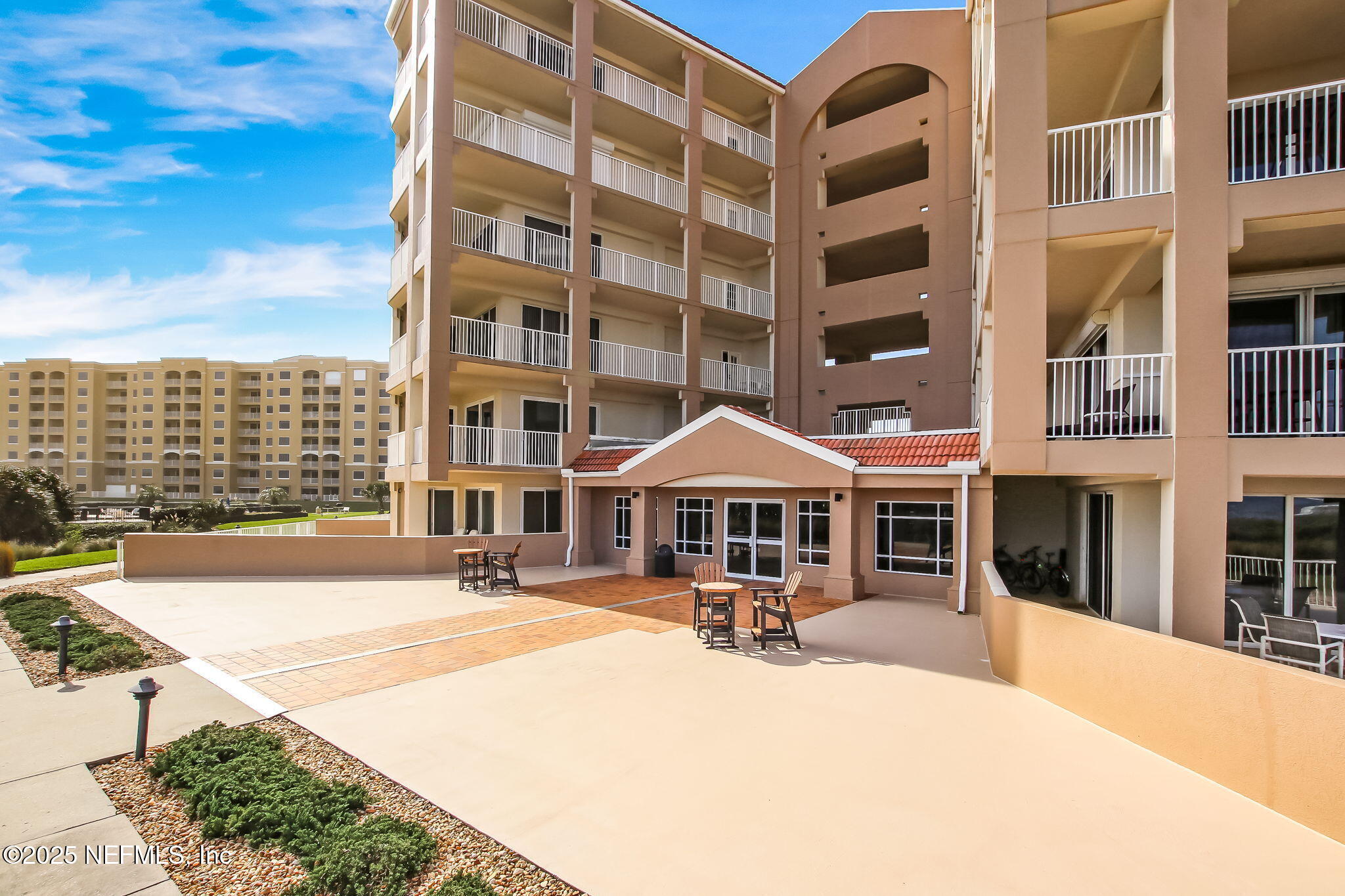 60 Surfview Drive, Unit 801 Palm Coast, FL 32137 - Photo 41 of 64 a front view of a building with street view