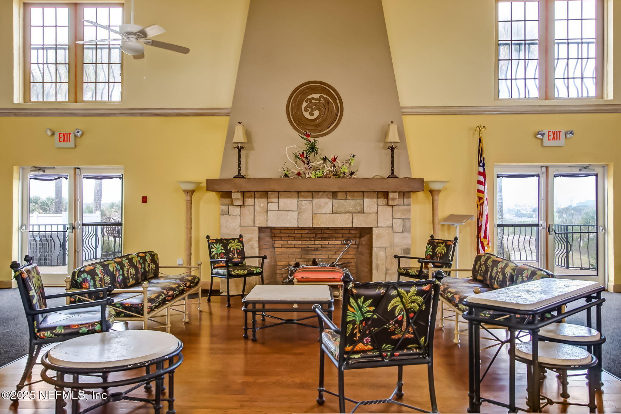 60 Surfview Drive, Unit 801 Palm Coast, FL 32137 - Photo 44 of 64 a living room with furniture and a fireplace