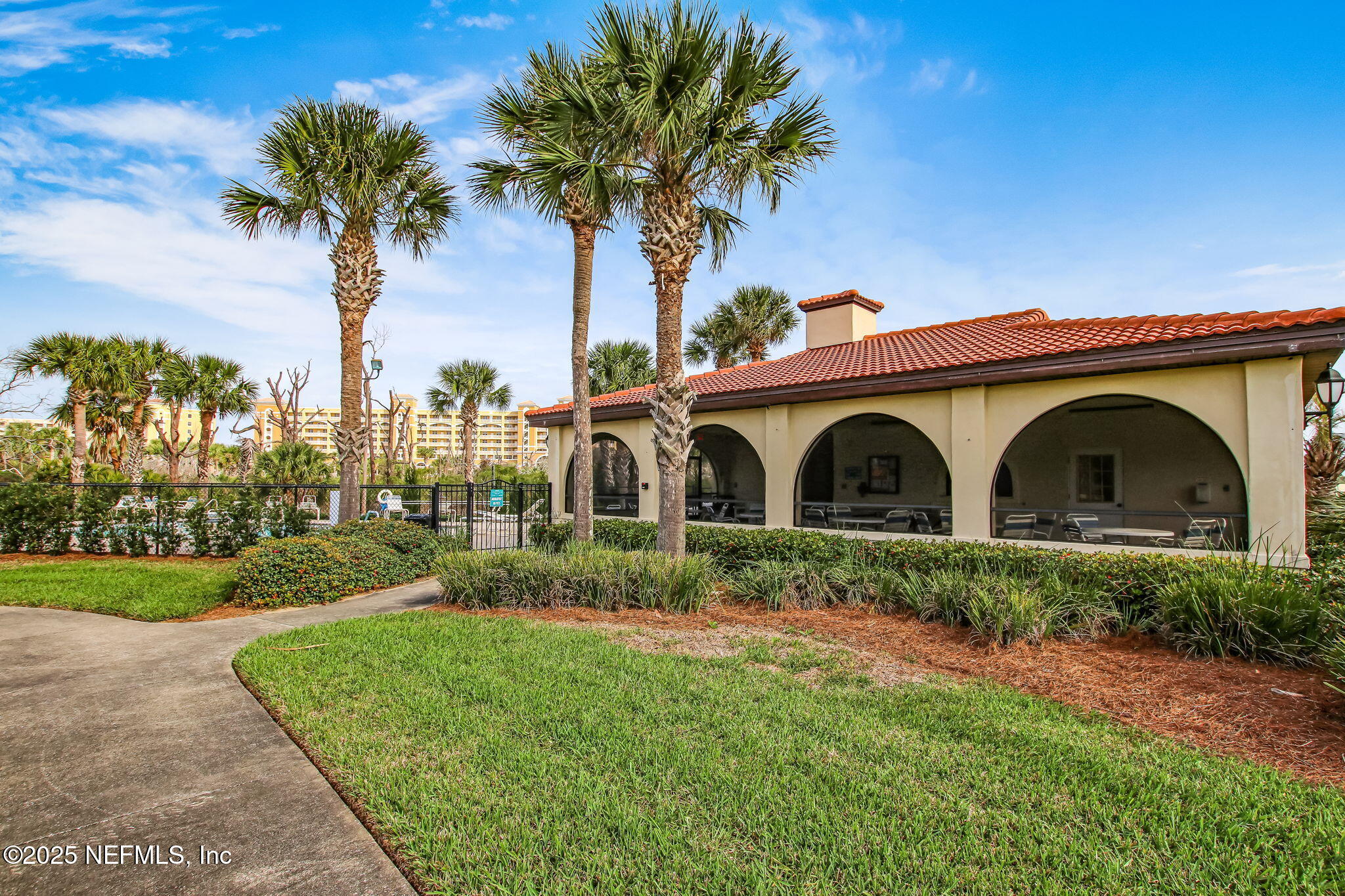60 Surfview Drive, Unit 801 Palm Coast, FL 32137 - Photo 45 of 64 a front view of a house with garden