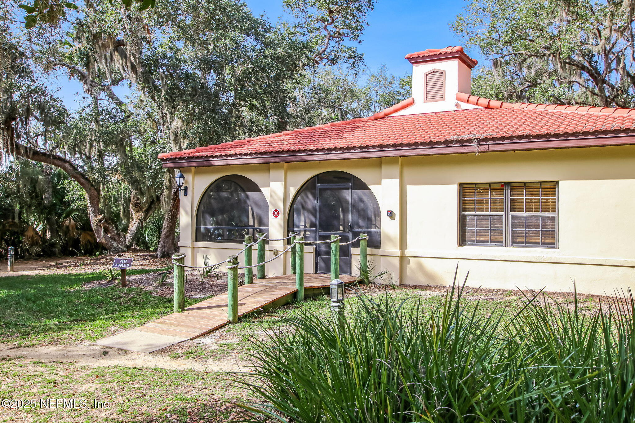 60 Surfview Drive, Unit 801 Palm Coast, FL 32137 - Photo 46 of 64 a front view of a house with garden