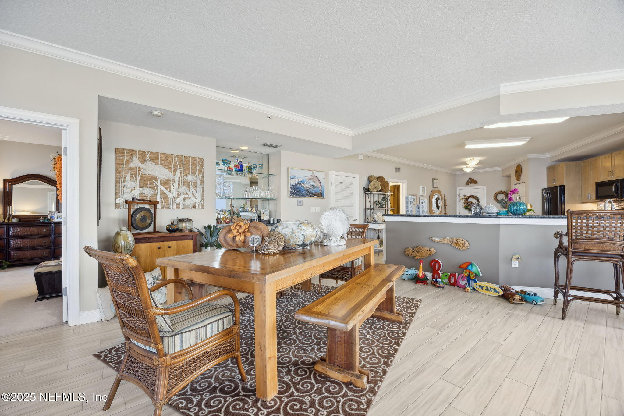60 Surfview Drive, Unit 801 Palm Coast, FL 32137 - Photo 10 of 64 a view of a living room and dining room