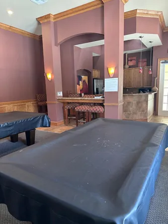 a lobby with furniture and window