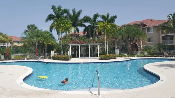 a view of a house with swimming pool