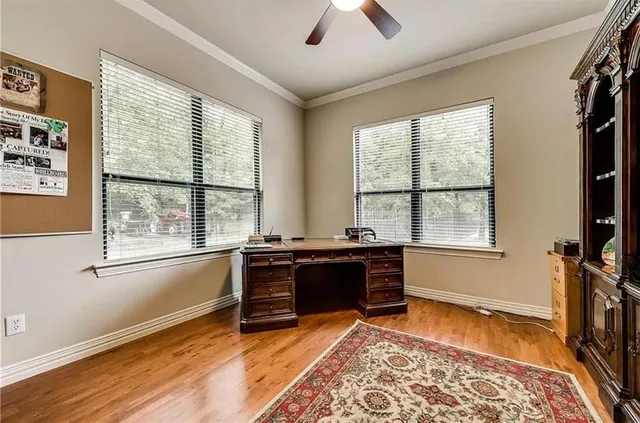 a view of furniture and a window in a room