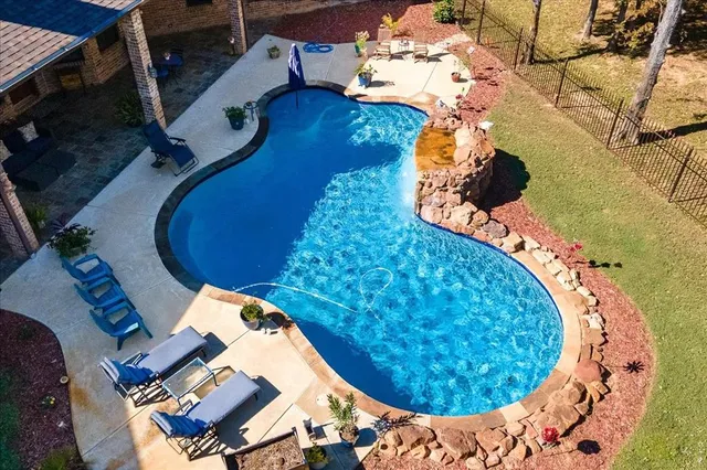 an aerial view of a swimming pool