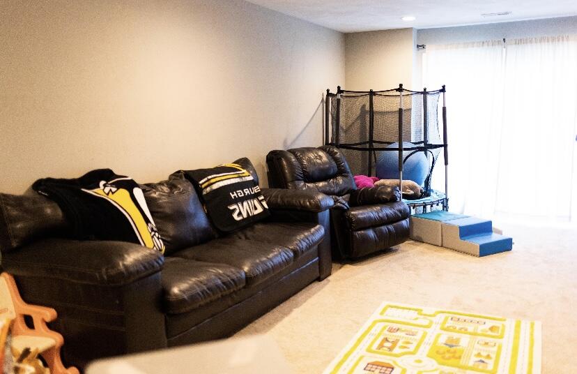 8320 Robin Lynn Road Roanoke, VA 24019 - Photo 14 of 21 a living room with furniture and a mirror