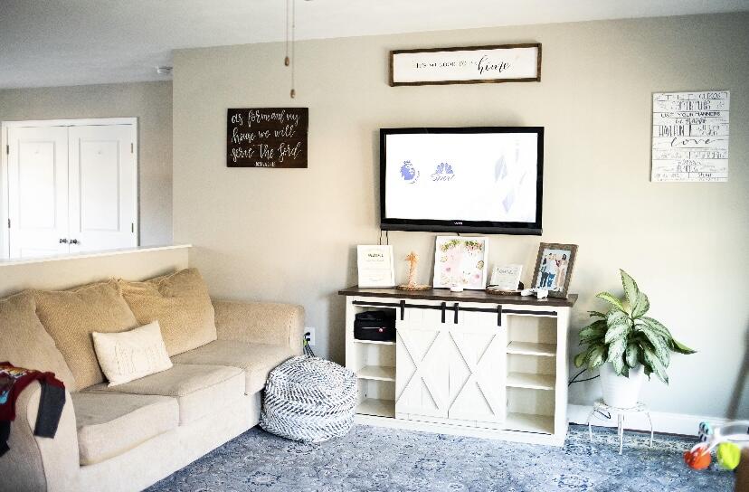 8320 Robin Lynn Road Roanoke, VA 24019 - Photo 2 of 21 a living room with furniture and a flat screen tv