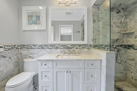 a bathroom with a sink and a toilet