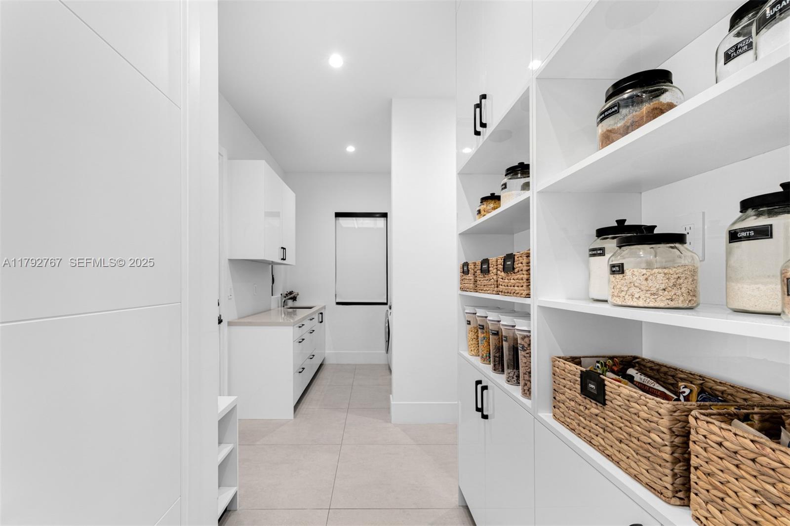 13180 Old Cutler Road Pinecrest, FL 33156 - Photo 13 of 66 a kitchen with stainless steel appliances granite countertop a refrigerator and a stove