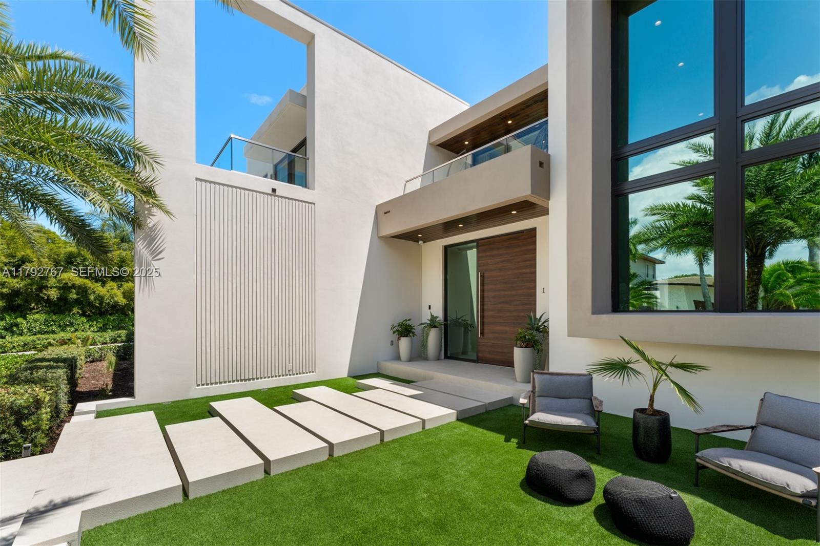 13180 Old Cutler Road Pinecrest, FL 33156 - Photo 9 of 66 a view of backyard of the house with seating area