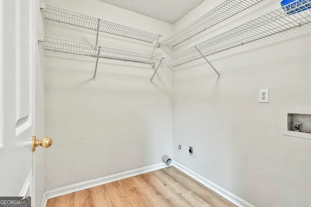 a view of a room with racks on the wall