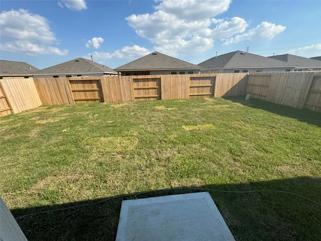 a view of a large garden with an outdoor space