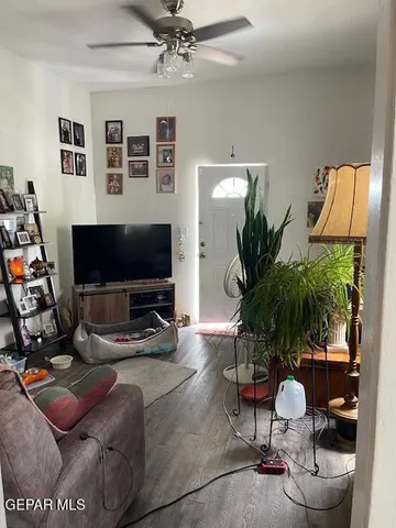 a kitchen with refrigerator and window