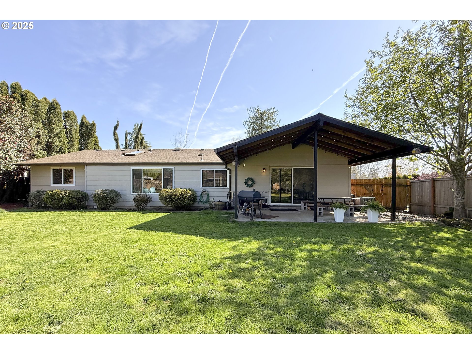 5013 Southeast 22nd Street Gresham, OR 97080 - Photo 24 of 38 a view of a house with a yard