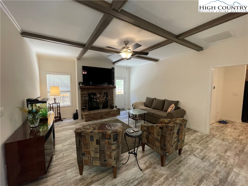227 Meadow Pines Trail Boone, NC 28607 - Photo 15 of 34 a view of a livingroom with furniture and a fireplace