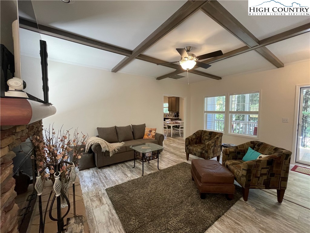 227 Meadow Pines Trail Boone, NC 28607 - Photo 16 of 34 a living room with furniture and a window