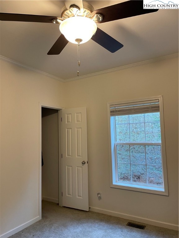 227 Meadow Pines Trail Boone, NC 28607 - Photo 30 of 34 a view of an empty room with a window
