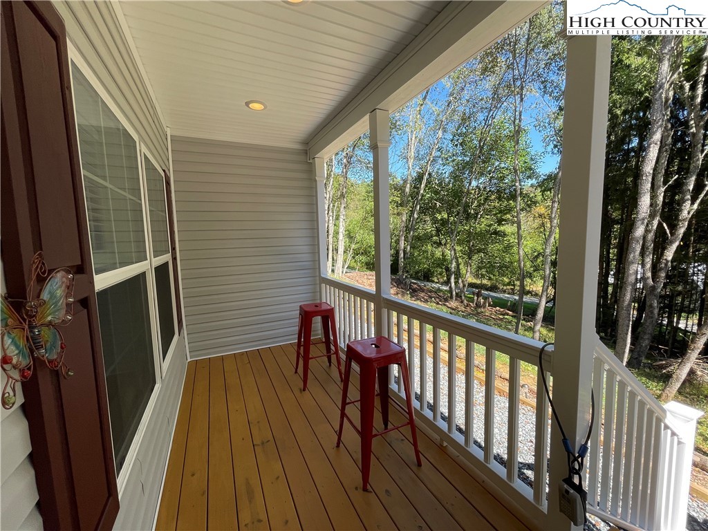 227 Meadow Pines Trail Boone, NC 28607 - Photo 10 of 34 a view of a balcony with wooden floor